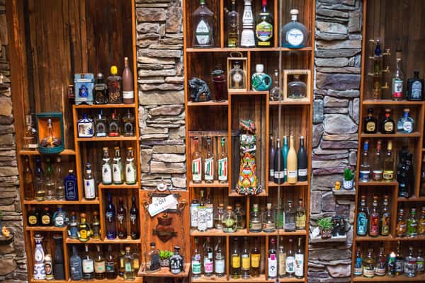interior bar with wall of liquors