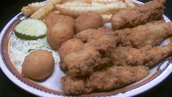 popcorn chicken served with hush puppies