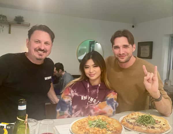 People sharing pizza
