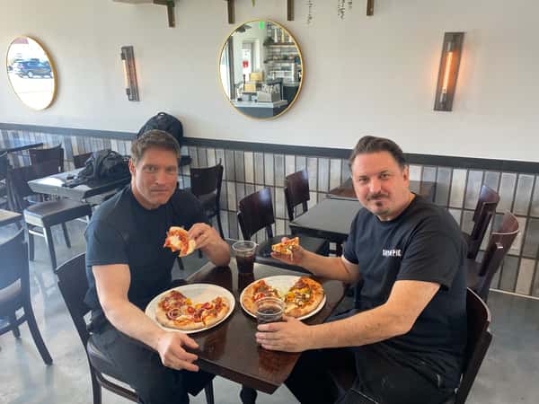 Men eating food