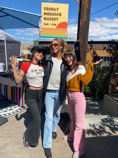 Women standing outside restaurant