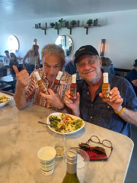 Men with drinks and food