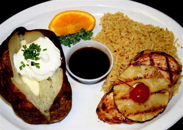 grilled chicken with baked potato and rice