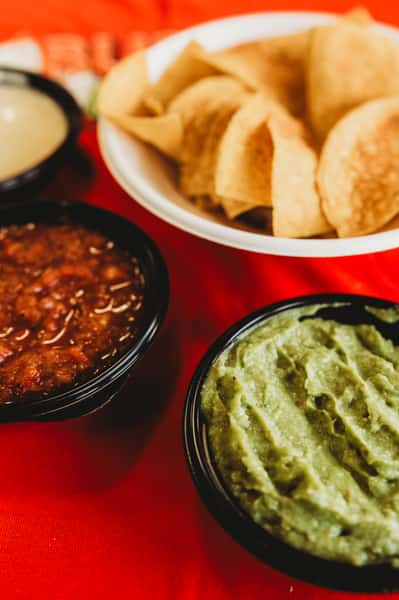 Dip Trio- Chips, Salsa, Guac, Queso
