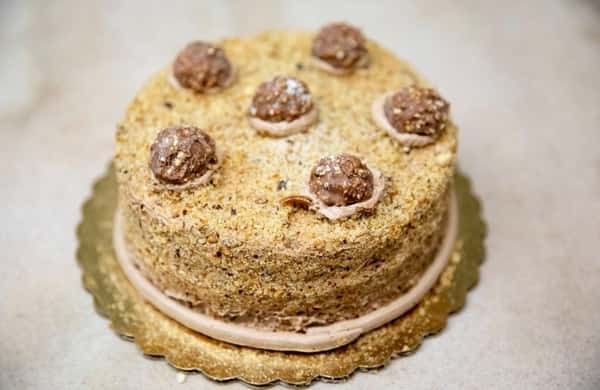 A cake covered in truffles