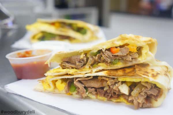 quesadilla with peppers, onions and beef. salsa on the side.
