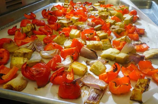 tray of onion, artichokes and bell peppers