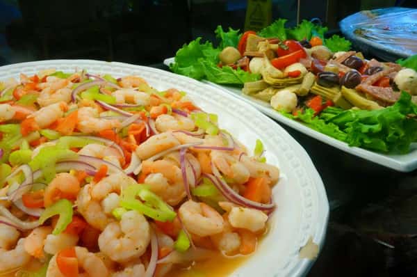 Tray of cold shrimp salad and cold antipasto