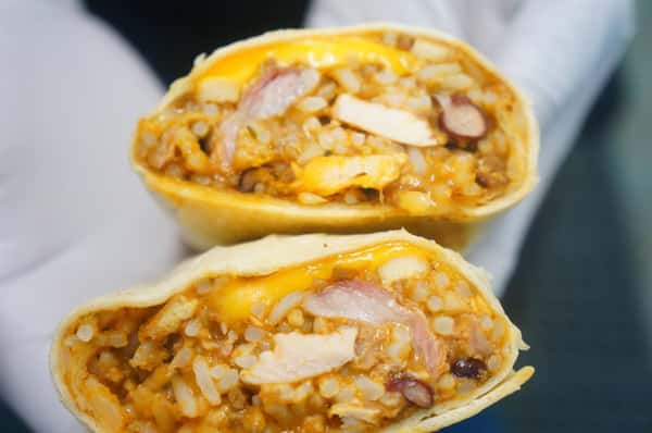 wrap made with chicken, rice, beans, and cheese.