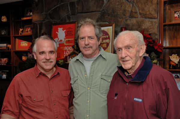 3 men posing for a photo