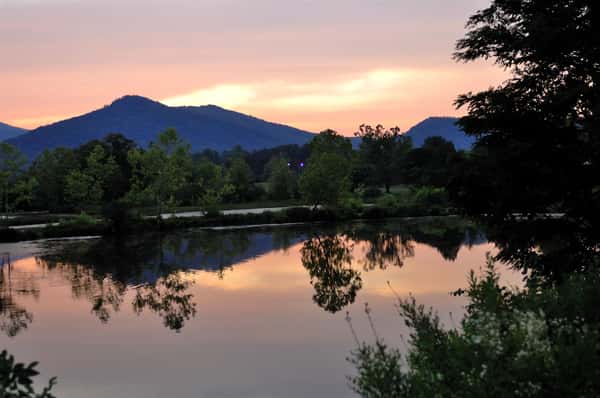 sunset over mountain and lake view