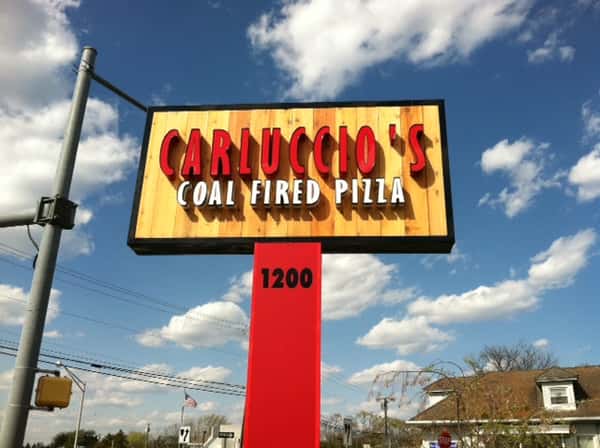 exterior signage for carluccio's coal fired pizza