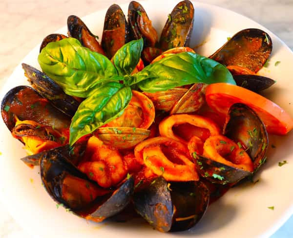 mussels, clams, and calamari in a marinara sauce