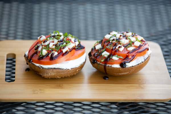 caprese bagel sandwich with fresh mozzarella, tomato, basil, and balsamic glaze