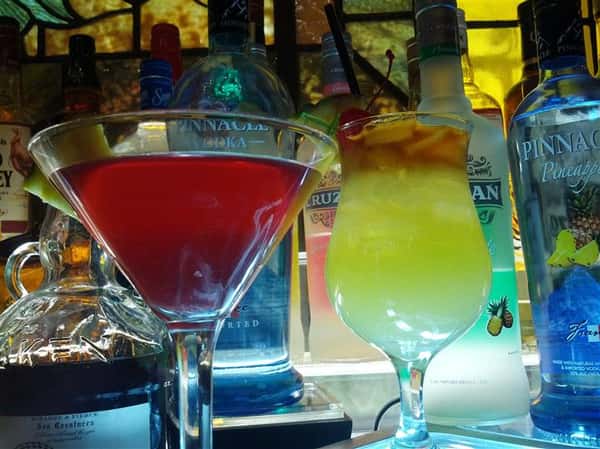 various mixed drinks displayed at the bar