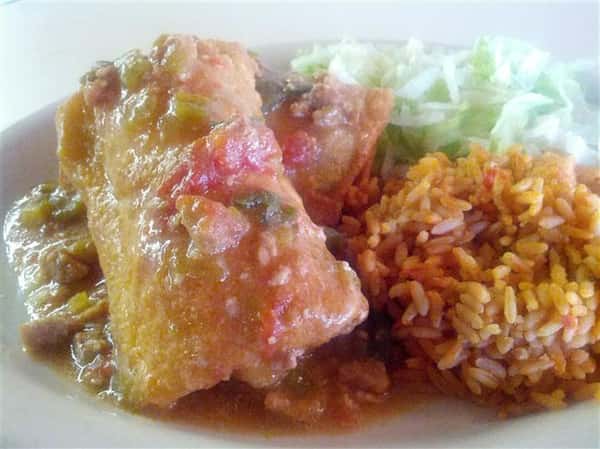 fried burrito with rice and a aside salad