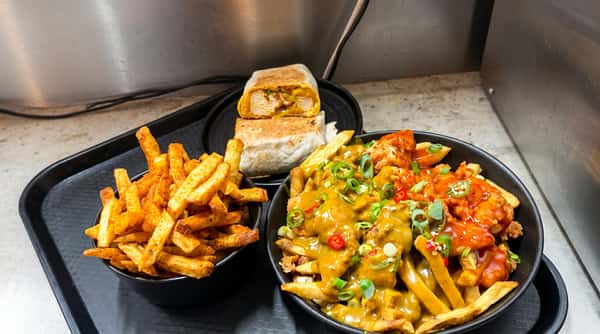 Loaded chicken fries with cheese and sauce