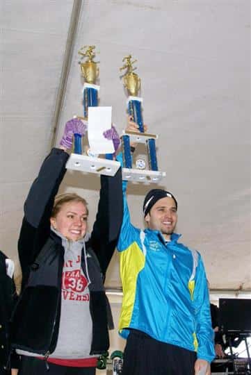 Marathon winners holding trophies