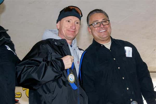 2 men smiling for a photo