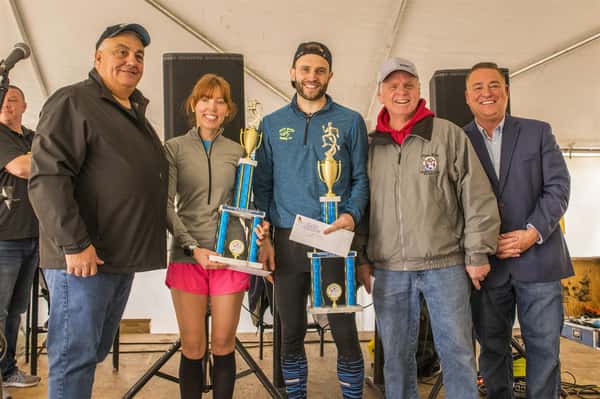 winners posing with teir trophies