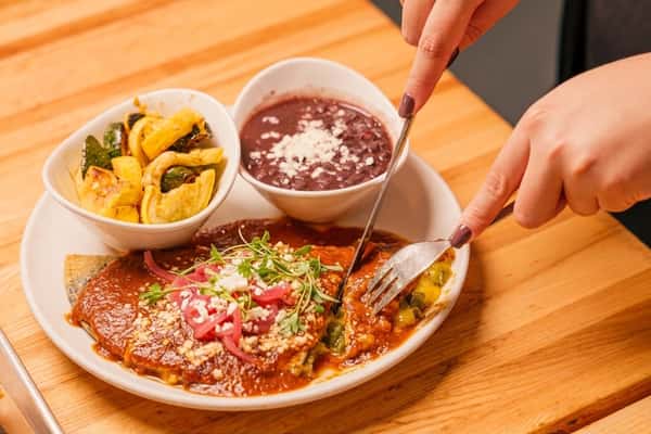 Our Mexico City Quesadilla has certainly earned the position of The Seis Signature Dish ✨ 🌶️ We love that you love this savory and fulfilling dish! 👏🏽 🙏 What begins with a large Gordita 🌽 tortilla and cheese-chicharron is then filled with green chilies and your choice of entree, like #birria, spicy tinga or sautéed squash, then topped with housemade red chili sauce (GF), Seis sauce, pickled onion, queso fresco and cilantro and served with choice of 2 sides. Wow 🤩 @seiskitchen #ScratchKitchen #MexicoCity #GlutenFriendly