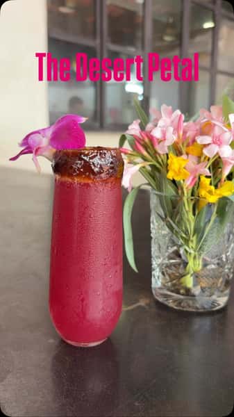 This just in. You are loving our new #Mocktail menu! 🙌🏽 💕 Your favorite NoLo? The Desert Petal 🌸 A nonalcoholic, vibrant blend of prickly pear juice, pomegranate, fresh lime juice 🍹 all shaken and served with a bold Chamoy-chili rim topped with an orchid and served any time of the day! Only @seiskitchen #ZeroProof #SpiritFree #SeisKitchen #NoLo