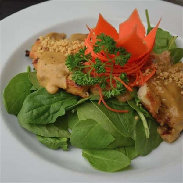 Thai food mix with fresh greens in meal