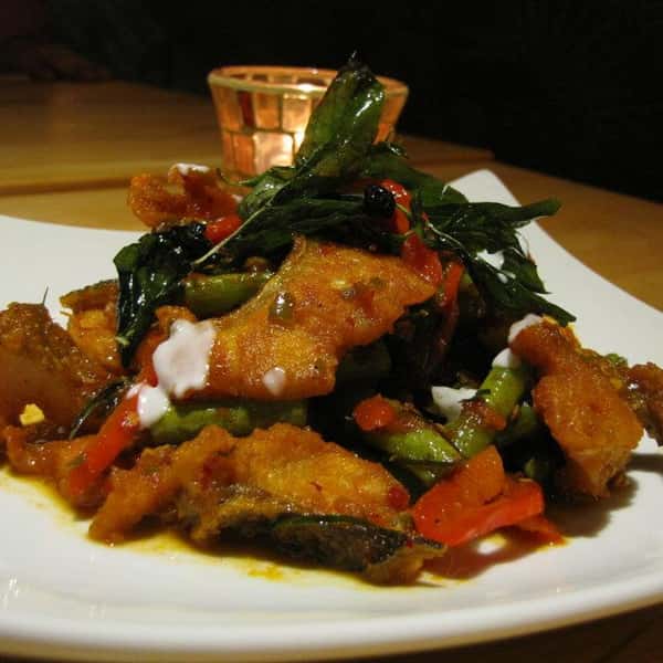Grilled Thai meal with moist sides