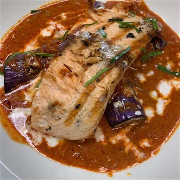 Chicken piece in a gravy