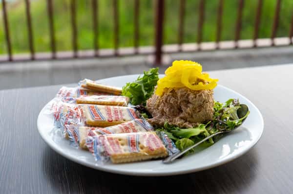 The smoke makes the difference. Prepared with patience. Served for sharing. A Nick’s favorite for good reason.
Our Yellowfin tuna is carefully smoked in-house on the Big Green Egg, giving every batch of our Smoked Tuna Dip its signature depth and unmistakable flavor.
Come taste what makes it different. Join us at Nick’s and make it the start of your next meal.