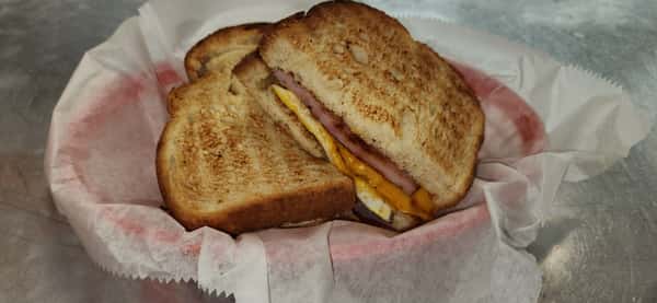 Breakfast Sandwich with Ham Steak, Eggs and Cheese