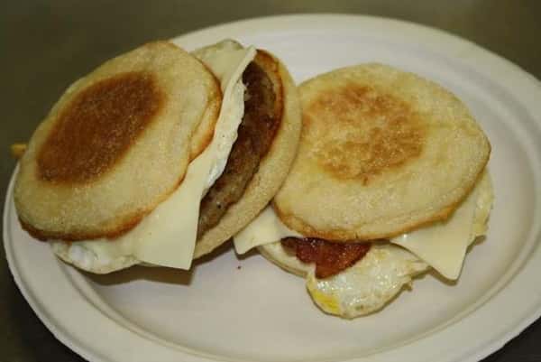 Breakfast sandwich on an english muffin with egg and cheese