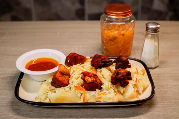 1 Yuca Con Cerdo