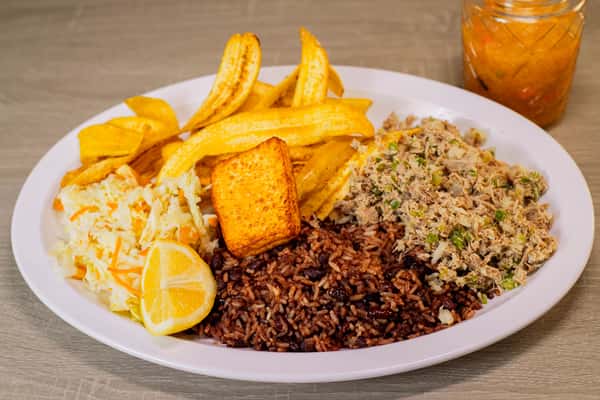 minced meat, served with Gallo pinto, Handmade Plantain chips or sweet soft plantain, fried cheese and cabbage salad