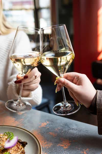 clinking wine glasses