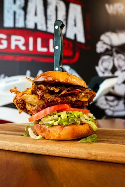Burger with knife through bun