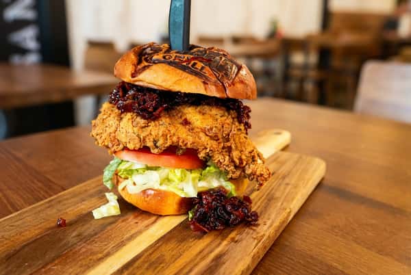Burger with knife through bun