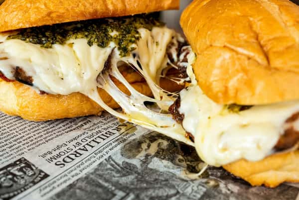 Creamy cheese split between a sandwich