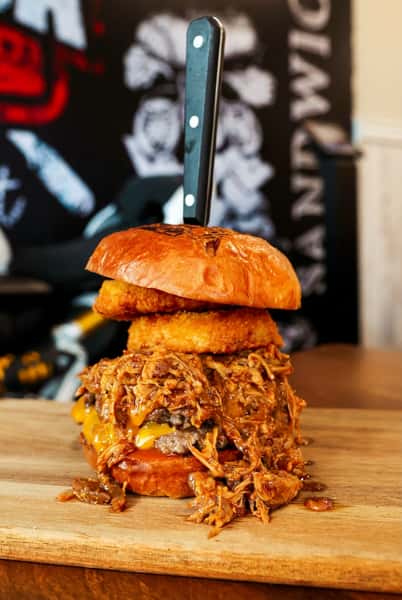Burger with knife through bun
