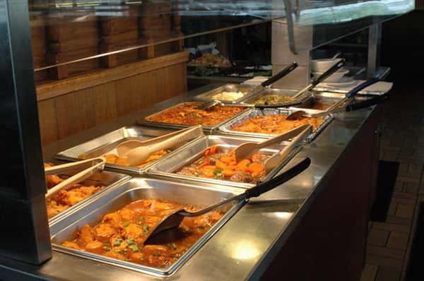 buffet assortment of dinner entrees and pasta dishes