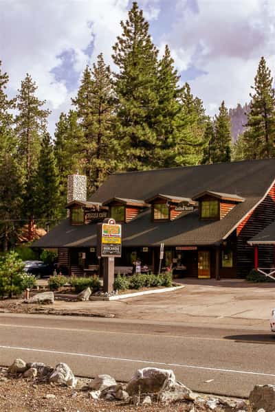 Right side exterior of Grizzly Cafe on a partly cloudy day