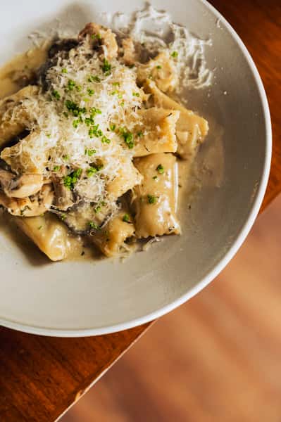 Pasta topped with grated cheese