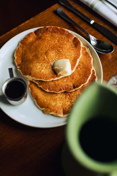 Three pancakes with syrup