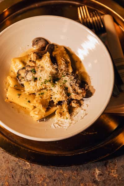 Plate of pasta with grated parmesan