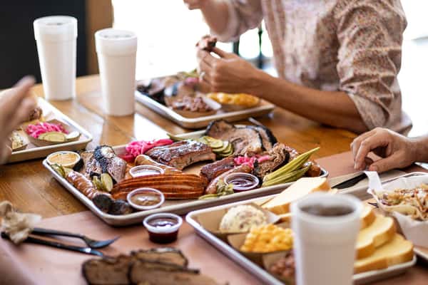Guests eating BBQ