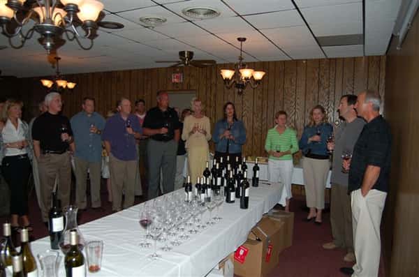 Archie's Friends and Family enjoying a wine tasting event.