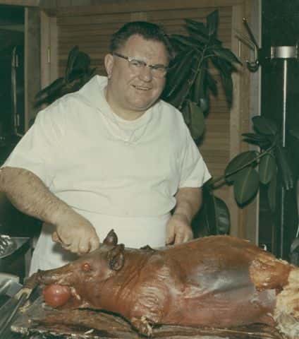 Archie preparing the pig roast
