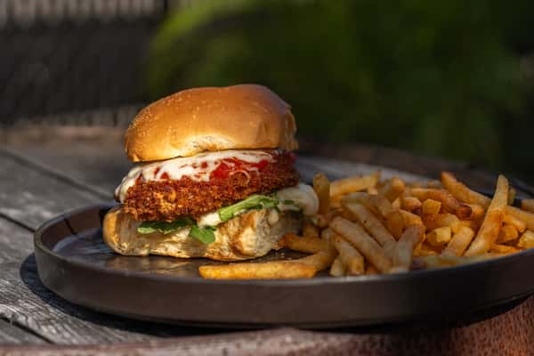Chicken Parmesan Sandwich with Fresh Mozzarella, Marinara, Arugula, Garlic Aioli at Coughlin's Law Kitchen and Alehouse, restaurant in Mount Washington, Pittsburgh with views of downtown pittsburgh