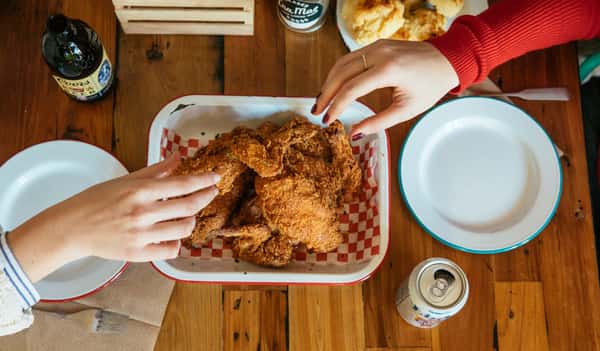 hand grabbing for chicken