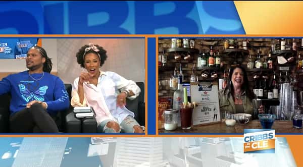 Zoom conference call with a couple on the left panel and a woman on the right panel